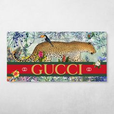 a gucci sign with a leopard and flowers on it's side, in front of a white wall