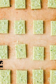 there are many squares of food on the baking sheet