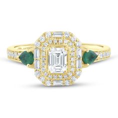 an emerald and diamond engagement ring with two pears on the side, set in yellow gold