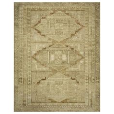 an antique rug with intricate design in beige and brown tones, on a white background