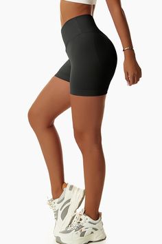 Fabrics: 83% nylon, 17% spandex Ribbed detail Seamless style High rise "V" shaped waistband in the front Bodycon fit Black Seamless Activewear With Built-in Shorts, Breathable Nylon Biker Shorts, High Stretch Solid Nylon Shorts, High Stretch Nylon Shorts In Solid Color, Stretch Moisture-wicking Seamless Shorts, Stretch Nylon Shorts In Solid Color, Casual Black Seamless Tights, Sporty Seamless Solid Color Tights, Sporty Solid Seamless Tights