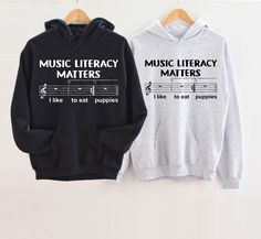 Music Literacy Matters Sweatshirt,I Like To Eat Pup-pies Song,Funny Music Sweater,Music Teacher Sweater,Gift For Music Lover,Funny Music Gift Sweaters Longsleeve, hoodie.  Vinyl designs are black or white. The design color would be chosen for you depending on the color shirt you chose. For example: * Black text/design will be printed on Light color shirts * White text/design will be printed on Dark color shirts  DTF designs are NOT able to be altered. They are printed as illustrated. These desig Music-themed Long Sleeve Cotton Top, Music-themed Cotton Long Sleeve Top, Music-themed Cotton Sweatshirt With Letter Print, Music-themed Letter Print Cotton Sweatshirt, Music-themed Cotton Letter Print Sweatshirt, Closet Revamp, Music Puns, Dtf Designs, Teacher Sweater