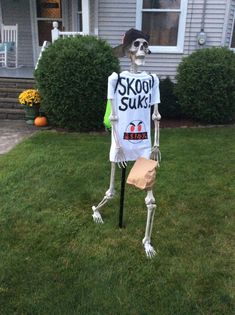 a skeleton with a t - shirt that says skooh suki on it