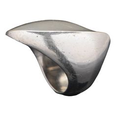 A nanna ditzel for georg jensen sterling silver ring. Designed as a curved undulating sculptural form. It sits beautifully on the finger, catching light from different angles. The ring size is 16/56. Its signed 'georg jensen, 925, denmark, 91    weight: approx. 15 grams.  nanna ditzel (1923 - 2005) is regarded as one of denmark’s most accomplished midcentury designers and she was the first woman to design for the georg jensen silversmithy in 1954. Her work has been exhibited at the metropolitan Georg Jensen Jewelry, Nanna Ditzel, Georg Jensen Silver, Scandinavian Jewelry, Scandi Design, Bracelet Love, Georg Jensen, Decorative Art, Metropolitan Museum Of Art