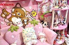 stuffed animals and toys are on display at a toy store