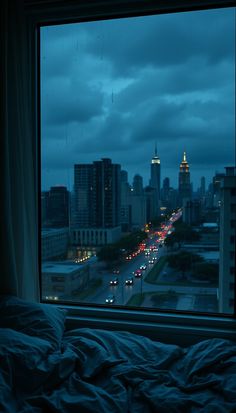 a city view from a window at night