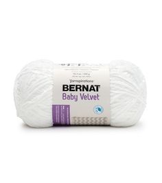 bernat baby velvett yarn ball in white, on a white background