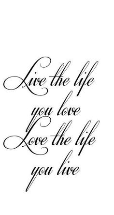 the words live the life you love, love the life you live written in cursive writing