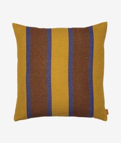 a brown and blue striped pillow on a white background