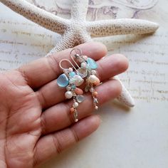 "Made to order. Please see my policies page or my shop announcement for current production times on made to order items. *The first seven pictures are of the earrings in sterling silver, and the last two are in rose gold filled. ~ coral, freshwater pearls, chalcedony, Swarovski crystals, keishi pearls, apatite, glass, mother of pearl, blue Peruvian opal ~ gold filled, rose gold filled, or sterling silver ear wires, wire and chain ~ 2 1/8 inches (5.4 cm), from the top of the ear wire to the botto Handmade Coral Drop Earrings, Handmade Coral Dangle Jewelry, Handmade Coral Sterling Silver Jewelry, Handmade Peach Dangle Jewelry, Handmade Peach Dangle Earrings, Aqua Gemstone, Peruvian Opal, Solitaire Necklaces, Earrings Pink