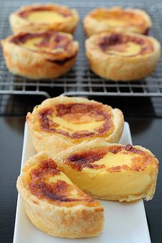 several small pastries on a white plate