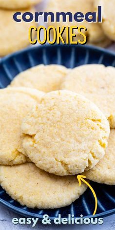 homemade cornmeal cookies on a blue plate with the words easy and delicious written below