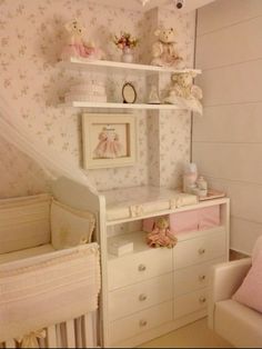 a baby's room with teddy bears on the shelves