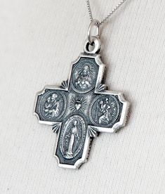 Solid 925 Sterling Silver Cruciform Cross Four-Way Medal Pendant Charm Antique Style Metal: 925 Sterling Silver Stamp: 925 Measurement: 40mm (1.57 inches) x 29mm (1.14 inches) Weight: approximately 5.48 grams Images may be enlarged to show details. Necklace chain is sold separately. Silver Pendant Necklace For Commemoration, Silver Sterling Commemoration Necklace, Silver Sterling Silver Commemoration Necklace, Commemorative Sterling Silver Necklace, Silver Cross Pendant Jewelry For Commemoration, Silver Necklace With Large Pendant For Commemoration, Necklace Chain, Antique Style, Solid 925 Sterling Silver