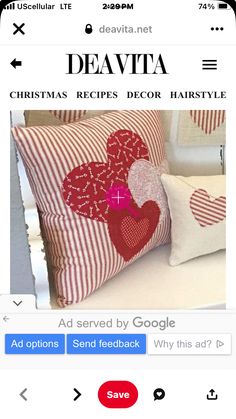 a red and white pillow with hearts on it