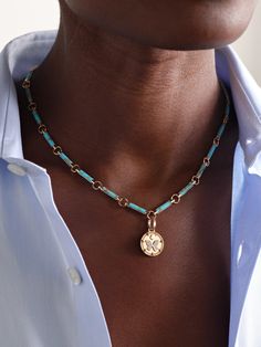 Rooted in symbolism, Foundrae's heirloom-inspired jewelry is meant to feel like part of the wearer. This 16-inch necklace is comprised of turquoise centered with a diamond-encrusted 'Reverie' medallion - it features a butterfly representing the inextinguishable soul, a roman numeral X for manifestation and a spade believed to be the energy catalyst. Turquoise Pendant Necklace With Detachable Pendant, Turquoise Necklace With Detachable Pendant, Luxury Turquoise Pendant Jewelry, Turquoise Jewelry With Detachable Pendant As Gift, Elegant Turquoise Necklace With Detachable Pendant, Heirloom Turquoise Necklace As Gift, Heirloom Turquoise Necklace For Gift, Elegant Blue Necklace With Coin Pendant, Gold Necklace Stack