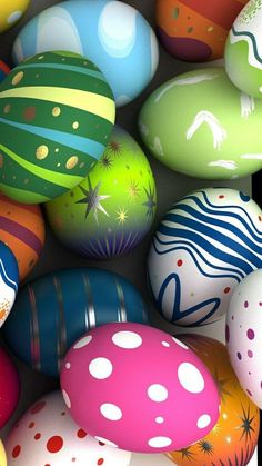 many different colored easter eggs in a pile