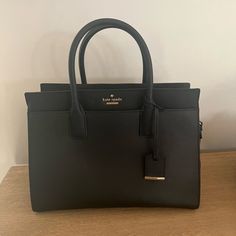 Brand New Used Once Strap Included Dust Bag Included Kate Spade Black Satchel For Travel, Kate Spade Black Travel Satchel, Kate Spade Black Satchel Bag, Kate Spade Black Satchel, Black Rectangular Kate Spade Bag, Kate Spade Black Tote Satchel, Black Kate Spade Tote Satchel, Kate Spade Black Top Handle Satchel, Kate Spade Black Satchel For Everyday