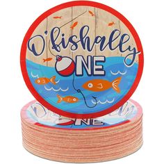 a stack of wooden coasters with the words fishy one on it and an image of