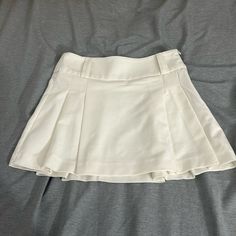 Brand New Size: Small White Lined Tennis Skirt For Day Out, White High Waist Lined Mini Skirt, Trendy White Pleated Skirt For Day Out, Elegant High Waist White Tennis Skirt, White Short Tennis Skirt For Day Out, White Pleated Tennis Skirt For Day Out, Pleated White Tennis Skirt For Day Out, Chic White Lined Tennis Skirt, White Lined Skort For Day Out