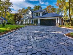 a large driveway in front of a house