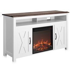 a white entertainment center with a fireplace in it