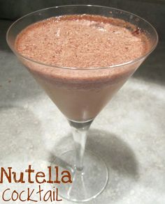 a martini glass filled with nutella cocktail