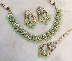 *Light Weight kundan necklace set with earrings. *Necklace width- 0.8 inches (included drops) *Earrings length- 2.1 inches( included drops) *Earrings width- 1.1 inches Green Festival Jewelry, Green Kundan Choker Necklace For Gifting, Festive Green Choker As Gift, Green Kundan Choker Necklace For Diwali, Green Stone Work Choker For Gift, Green Chandbali Choker For Diwali, Festive Green Chandbali Choker, Green Choker Necklace With Stone Work, Diwali Green Chandbali Choker