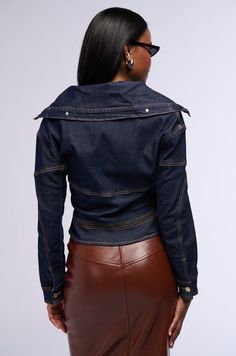 Level up your denim collection with The AKIRA Label Raw Denim Collared Jacket. This semi-stretchy denim piece features a wide fold over collar, long sleeves with buttoned cuffs, utility seaming, faux silver metallic hardware, contrast stitching, and decorative button detailing. Complete with a slight cropped front, symmetrical pointed hems, and button down front closures. Style with a denim maxi skirt and mules to finish off your look.  - Shell: 60% Cotton 35% Polyester 3.5% Viscose 1.5% Spandex - Semi-Stretchy - Imported (all measurements are approximate from size small) - 20.5” Shoulder to Hem - 21.5” Sleeves - 20.5” Shoulder to Shoulder  - Model is 5’8” Product ID: 392740 (all measurements are approximate from size 1X) - 23” Shoulder to Hem  - 23.5” Sleeves - 25” Shoulder to Shoulder Pr Collared Jacket, Denim Maxi, Denim Maxi Skirt, Denim Collection, Raw Denim, Fold Over, Level Up, Maxi Skirt, Coats Jackets