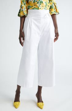 The label's signature sophistication shines in resort-ready trousers cut from stretch-enhanced cotton in a high-waisted silhouette with cropped wide legs. A slender bow ties the whole look together. 25" inseam; 24" leg opening; 14" front rise; 17" back rise (size 8) 97% cotton, 3% elastane Dry clean Made in the USA Designer Clothing Hispanic & Latinx Owned/Founded Elegant High-waisted Cotton Culottes, Elegant Cotton Culottes, Formal Cotton Wide Leg Pants For Summer, Cropped Wide Leg Trousers, Led Fashion, Wool Pants, Wide Legs, Cropped Trousers, Free Fabric