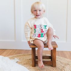 Get into the festive spirit with our Holly Jolly Vibes Christmas Sweatshirt Romper! This adorable romper combines the cozy comfort of a sweatshirt with the fun and whimsy of a holiday outfit. Perfect for holiday parties, family gatherings, or just lounging around the house during the holiday season. The Holly Jolly Vibes Christmas Sweatshirt Romper features a cute and festive holiday design that is sure to spread cheer wherever you go. Made from high-quality materials, this romper is as durable Holly Jolly Vibes, Sweatshirt Romper, Holiday Outfit, Festive Holiday, Holly Jolly, Holiday Design, Family Gatherings, Comforters Cozy, A Holiday