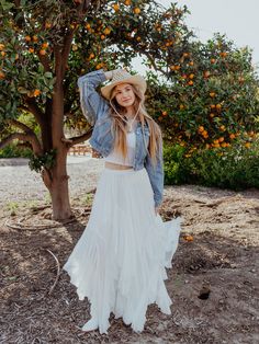 Float through your day with the breezy charm of our Tiered Maxi Skirt, a piece that whispers of ocean breezes and golden coastlines. Its full lining and elastic waistband ensure a blend of comfort and style that's as free-spirited as it is functional. Bohemian Flowy Maxi Skirt For Day Out, Flowy Bohemian Maxi Skirt For Day Out, Breezy Ruffled Maxi Skirt For Vacation, Flowy Maxi Skirt With Elastic Waistband For Summer, Bohemian Maxi Skirt With Elastic Waistband For Day Out, Bohemian Maxi Skirt For Spring Day Out, Bohemian Relaxed Skirt For Day Out, Summer Bohemian Ruffled Skirt, Bohemian Tiered Skirt For Day Out