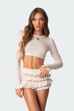 PRODUCT INFO Crop top Ruffle sleeves Embroidered knitted fabric Acrilan Model wears size XS/S Model height is 5'8 Item care: Hand wash Shorts Outfits Women, Flare Long Sleeve, Cropped Pullover, Shorts Outfits, Sweater Crop, Long Sleeve Knit Sweaters, Cropped Tops, Ruffle Shorts, Crop Top Sweater