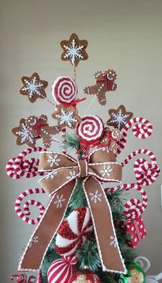 a christmas tree decorated with candy canes and cookies