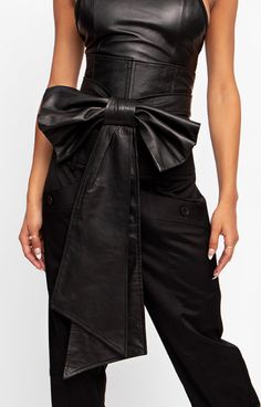 Inspired by and designed for the courageous dresser, our Oversized Bow Corset Belt cascades from waist to knee, creating a silhouette that is equal parts bold and playful. Team over a leather bodysuit for a sweet all-leather look, or slip over a dress for a night out. Back zip closure Lining: Silk 100 % lamb leather Made in Toronto This item is made-to-order in our Toronto studio and will be shipped within 2-3 weeks of purchase. We will follow up with you over email within 2 business days of you Romantic Encounter, Bow Corset, Leather Bodysuit, Bow Belt, Corset Belt, Leather Bow, Out Back, Leather Bows, Leather Fashion