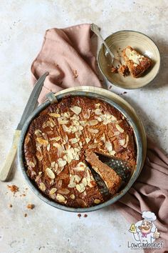 a cake in a pan with slices cut out