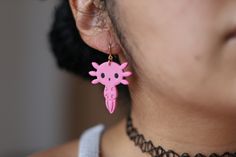 Dive into the world of whimsy and aquatic charm with our adorable Axolotl Earrings! Handcrafted with love and attention to detail, these delightful earrings capture the essence of the fascinating axolotl, an aquatic creature known for its unique appearance and endearing smile. Each pair is a miniature work of art that adds a touch of playfulness to your everyday style. They are the Perfect Gift: Looking for a unique and thoughtful gift for the animal lover or marine enthusiast in your life? Thes Axolotl Earrings, Art Miniature, Amphibians, Animal Lovers, Everyday Style, Everyday Fashion, Thoughtful Gifts, Jewelry Earrings Dangle, Animal Lover