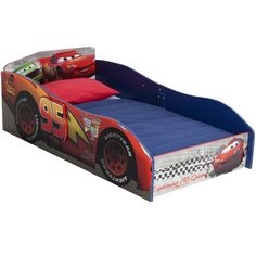 the bed has cars on it and is blue with red trim, but no sheets