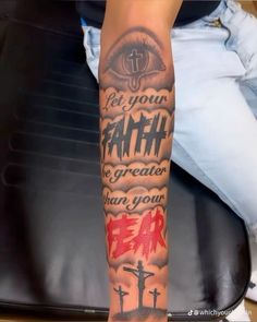 a person with a tattoo on their arm that says let your faith be greater than your fear