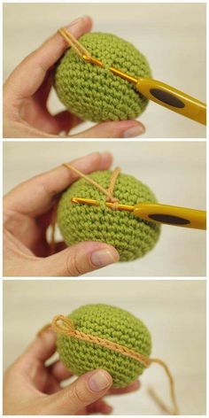 crocheted green ball being worked on with yarn