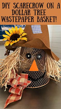 a scarecrow on a table with sunflowers and text overlay that reads diy scarecrow on a dollar tree waste paper basket