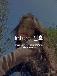 a girl with long hair standing in front of trees and the words'meaning, truly clear & pure origin korean