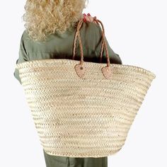 Go chic with our French Straw Basket featuring double flat leather handles! Handcrafted with 100% natural palm leaves, this basket is perfect for a day at the beach or a trip to the market. Say oui to style and sustainability with this French creation! Large flat leather handles for carrying on the shoulder and small leather handles for carrying the hand. easy to wear over the shoulder, The short and long handles are super handy Perfect for the Farmers Market, running errands, the beach or a picnic. Made with 100% Natural Palm Leaves Handmade in Morocco Color: Natural Basket Straw Bag With Leather Handles, Everyday Palm Leaf Straw Bag With Leather Handles, Diy Purse Organizer, French Market Basket, Vegan Tote Bag, Clear Handbags, Market Basket, Straw Basket, Market Baskets