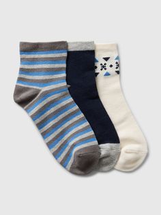 Soft stretch knit crew socks.  Ribbed top.  Reinforced toe and heel.  Assorted prints & designs.  These socks are made with 10% recycled polyester.  Compared to virgin materials, using recycled materials helps to reduce resource use and waste.  For more fit and sizing info, check out our Size Guide. Holiday Prints, Gap Kids, Ribbed Top, Kids Socks, Toddler Gifts, Crew Socks, Recycled Materials, Baby Toddler, Old Navy