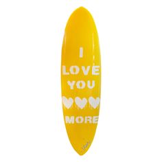 a yellow surfboard with the words i love you more on it's side