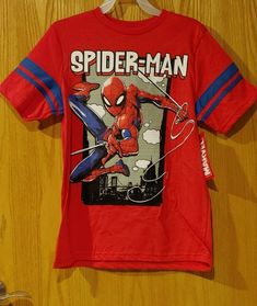 This is a New Boys Marvel Spiderman T-Shirts in size XL 14/16 in Red. If you have any questions please feel free to ask and I do combine shipping cost.   Please pay within 2 days.  ***As much as I try to take the best most accurate picture of items sometimes the camera will not capture the color of the items 100% accurate, so it is possible that the color might be a little darker/lighter/brighter**** Red Cotton Shirt With Screen Print, Red Graphic Tee For Fans, Red Cotton T-shirt With Character Print, Red Character Print Tops For Streetwear, Red Cotton Shirt With Graphic Print, Red Short Sleeve Shirt For Fan Merchandise, Red Character Print Short Sleeve Tops, Red Short Sleeve Tops With Character Print, Red Cotton Crew Neck Shirt