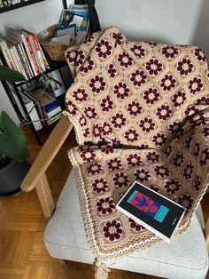 a chair with a book on top of it