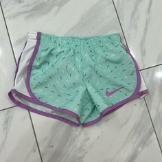 Toddler Nike Dri-Fit Shorts Size Xs/4 For 3-4 Years Lined. Purple And White Nike Swoosh. Nwot. Playful Green Sports Shorts, Playful Nike Cotton Bottoms, Playful Cotton Bottoms By Nike, White Shorts For Playwear In Spring, Playful White Bottoms With Built-in Shorts, White Shorts For Spring Playwear, Nike Summer Shorts For Playwear, Nike Shorts For Summer Playwear, White Shorts With Built-in Shorts For Playwear