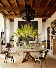 an instagramted photo of a dining room table and chairs