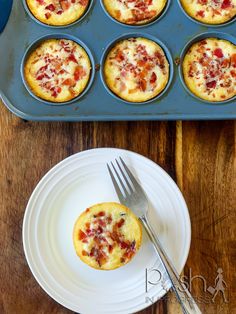 mini bacon and cheese muffins in a muffin tin with a fork on a plate